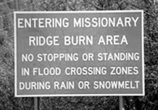 Road Sign: "Entering Missionary Ridge Burn Area, No Stopping or Standing in Flood Crossing Zones During Rain or Snowmelt"